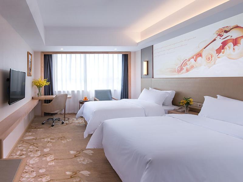Vienna Hotel Shenzhen Pingji Ave Exterior foto